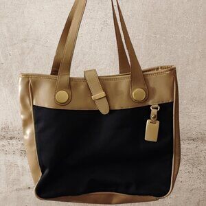 A Jaclyn Smith vintage style two-tone canvas or faux leather tote bag with gold-